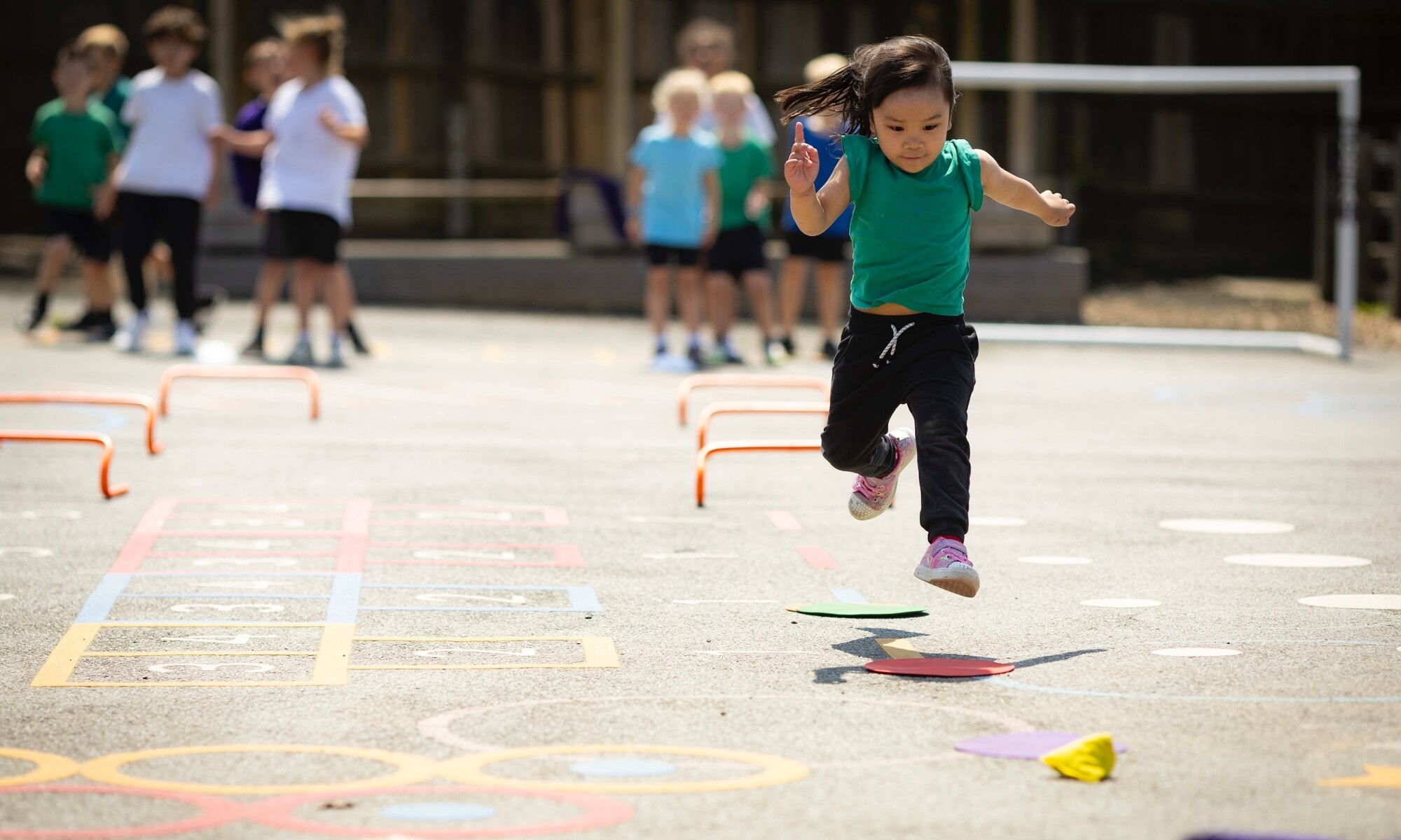Peacehaven Heights Academy pupil learning how to jumpover hurdles